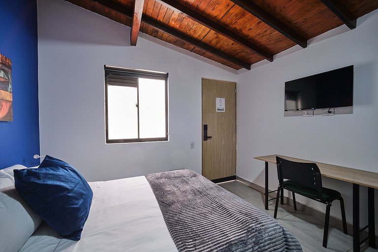 Laureles Living Blue 203 | Work & Stay · AC